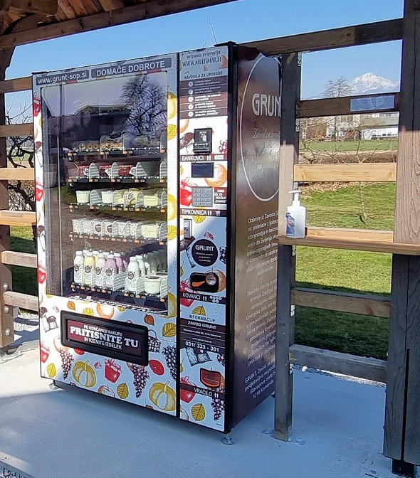 Multimat milk vending machine at Kmetija Grunt 50 under a hayrack